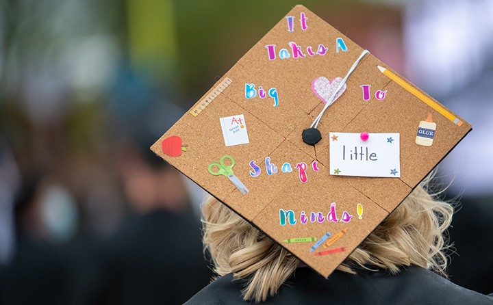 grad cap on teaching