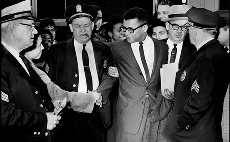 Rev. James Lawson, center, is arrested in front of the First Baptist Church on March 4, 1960. Rev. Lawson was arrested on charges of conspiring to violate the state's trade and commerce law. 