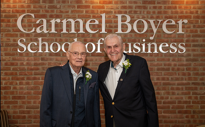 Willard E. Carmel ’52 (left)and George T. Boyer ’51 (right) retired from the BW board in October after a combined 94 years of service.
