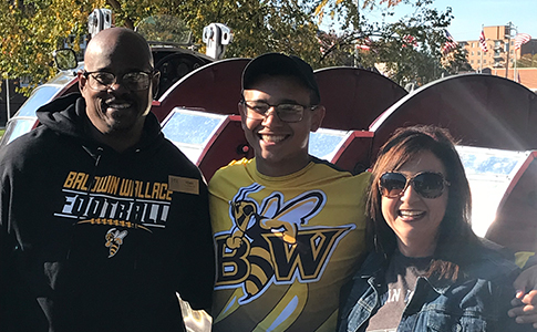 Photo of Anthony (Tony) Walker ’92 and Jennifer (Walton) Walker ’92 with their son Xavier