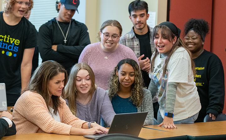 Dr. Lauren Copeland huddles with some of her BW students