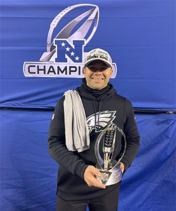 Joe Kasper with the NFC Championship trophy