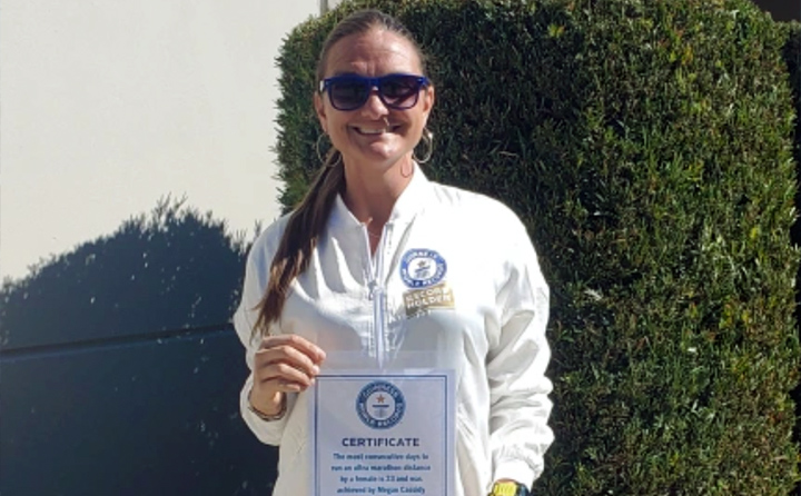 Megan Cassidy shows off her Guinness World Record certificate.