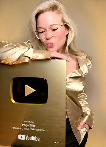 Paige Zilba with her Gold YouTube award. 