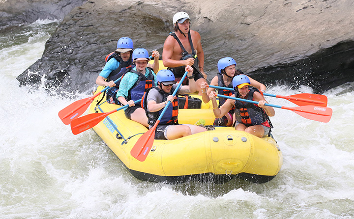 Students whitewater rafting