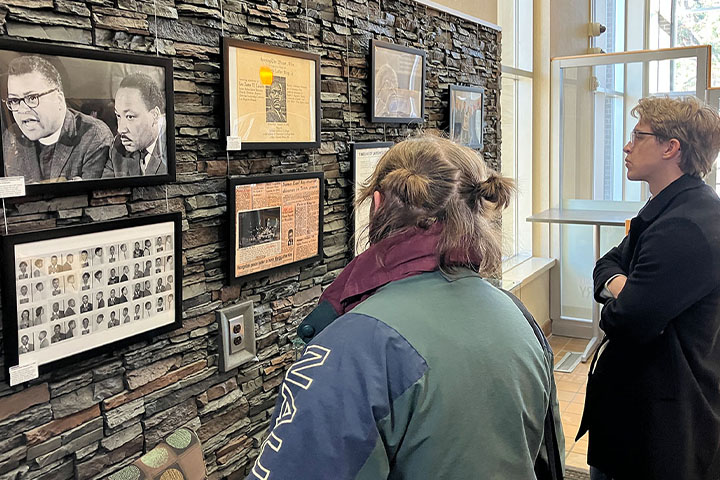 Female student singing into microphone