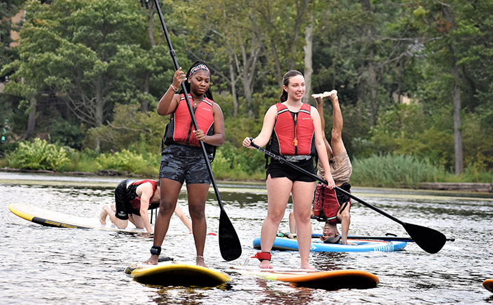 Image of Students Paddleboarding