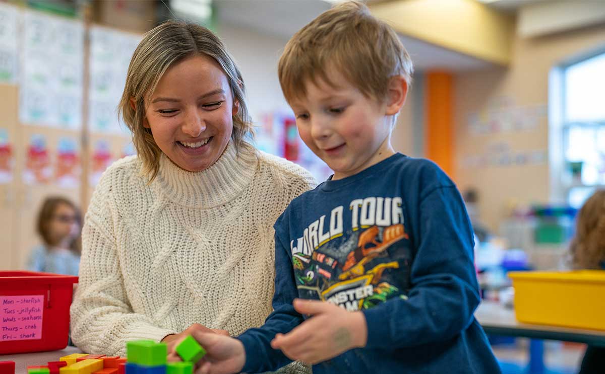 Education Major Working with a Young Student