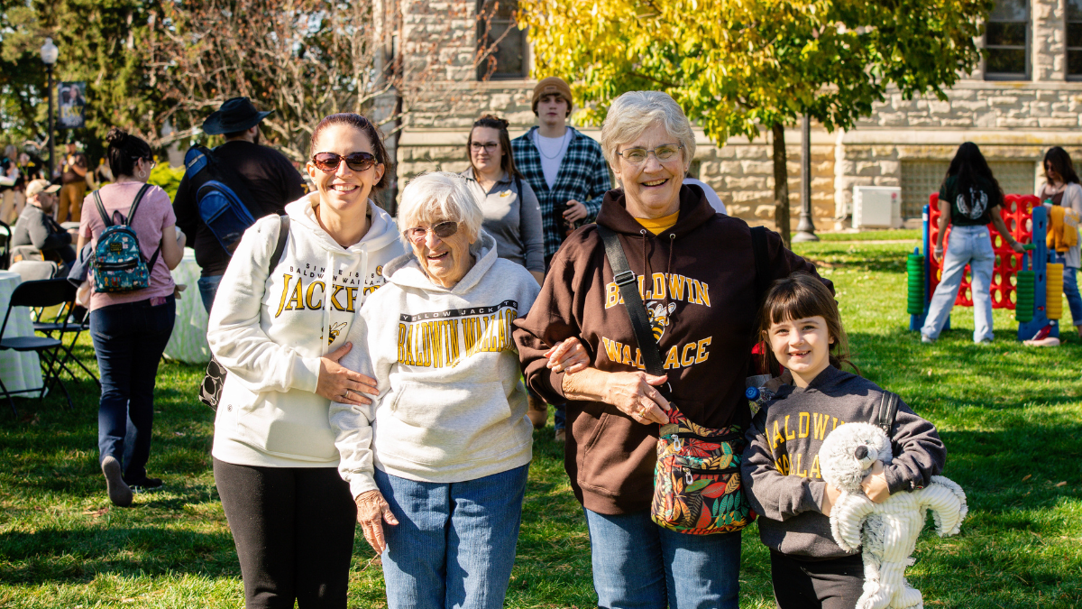 Photo of alumni returning to campus for homecoming.