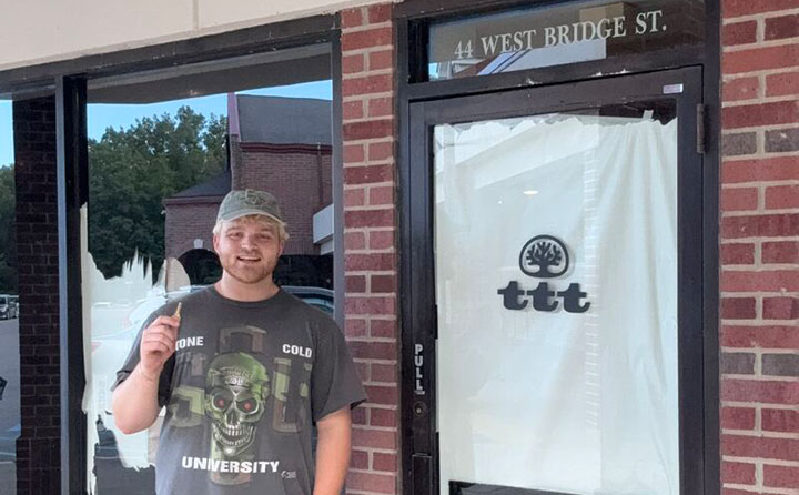 Noah Mowery outside his Berea storefront.