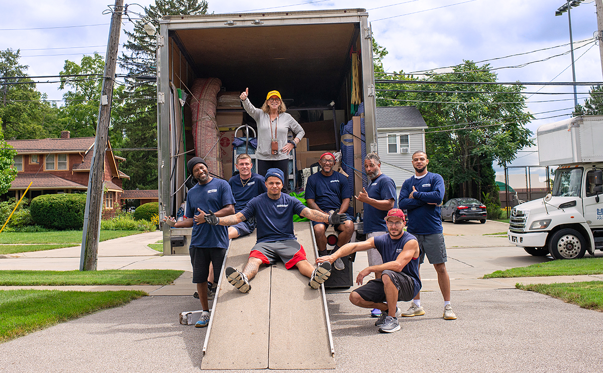 Peggy Fisher with moving crew