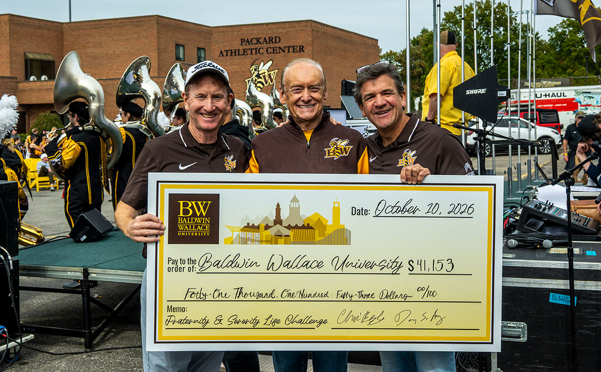 FSL Challenge check presentation to Lee Fisher
