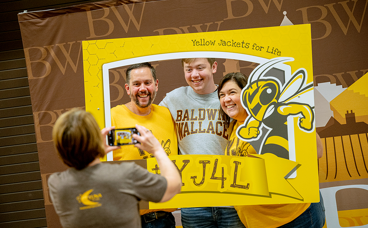 BW Parent Family Weekend family poses at tailgate event