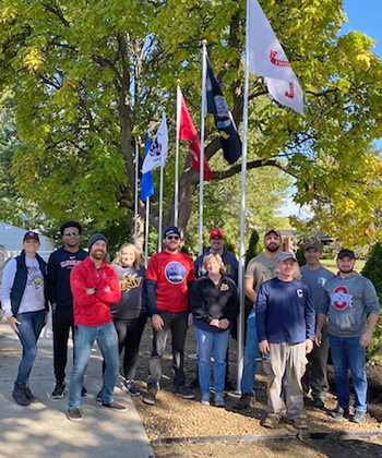 Military-flags-with-volunteers.jpg