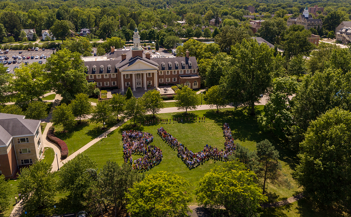Aerial of students spelling out BW outside Strosacker