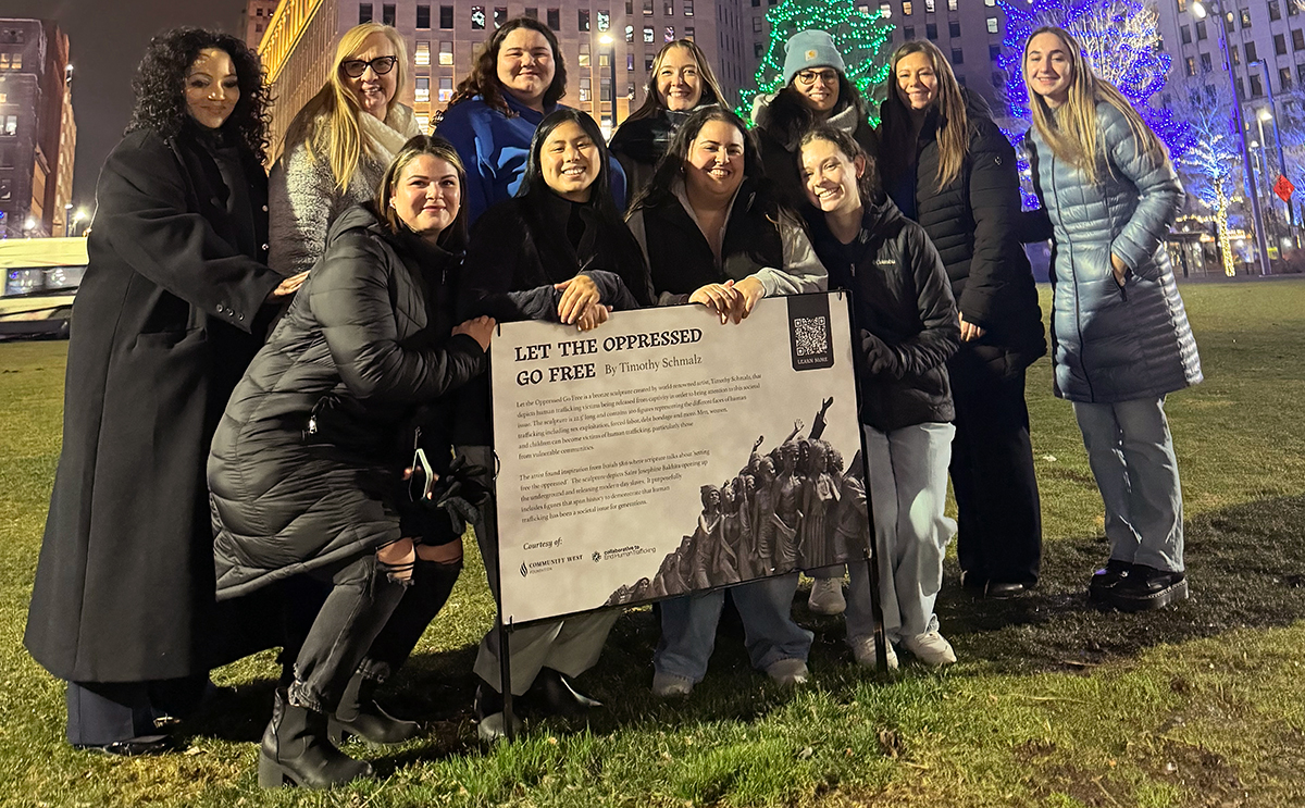 bw-students-with-sign-about-human-trafficking.jpg