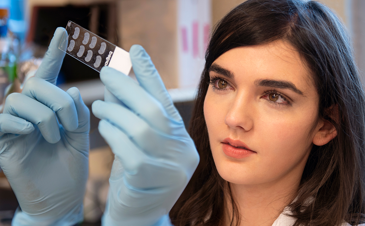 Photo of BW alumna Christin Godale in lab