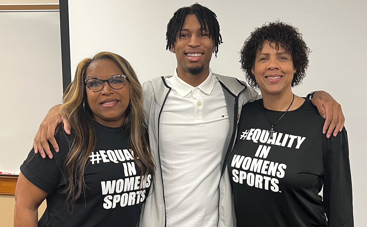 Sport management major Rob Watson '24 flanked by Cynthia Cooper-Dyke and Cheryl Miller.