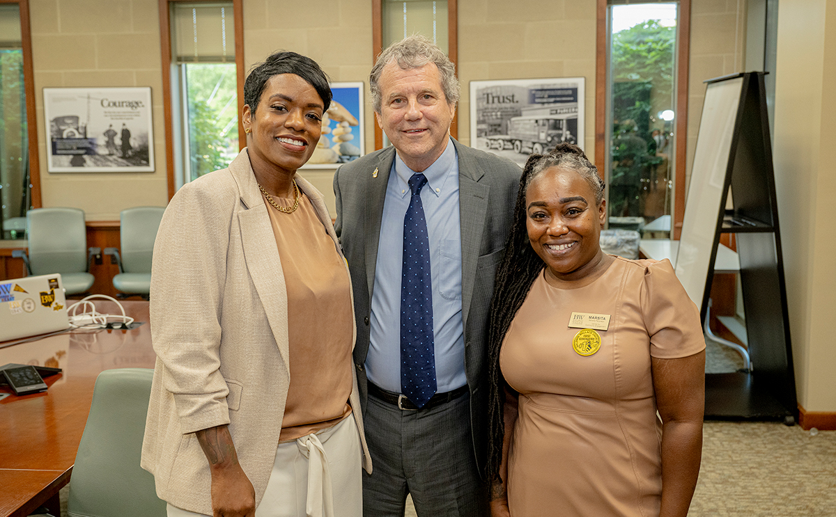 US Senator Sherrod Brown (center), Dr. Timeka Rashid, VP for Student Affairs (left) and Marsita Ferguson, interim director of BW’s David & Frances Brain Center for Community Engagement (right).