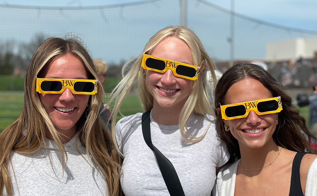 Trio of BW students in eclipse glasses